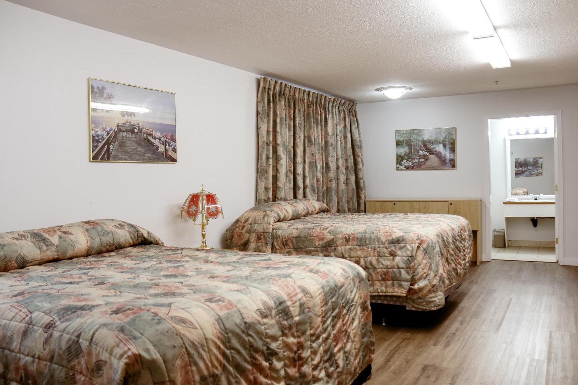 Western Budget Plus Mosaic Suites Penhold Dış mekan fotoğraf